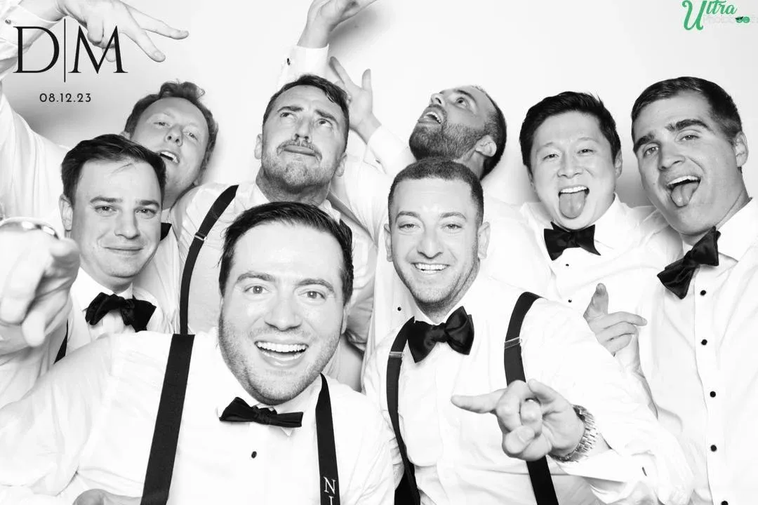 Guests using the Glam Photo Booth at an event - Image 4
